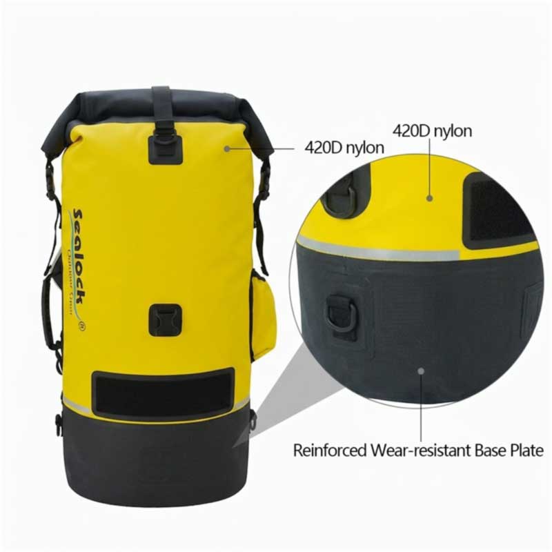 Reinforced abrasion base panel on a kayak dry bag against the main body fabric