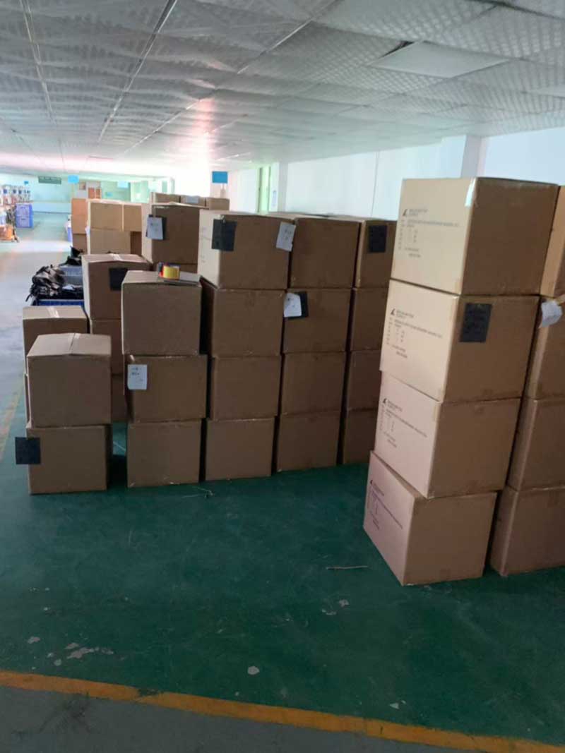 Export cartons stacked and marked, staged for shipment